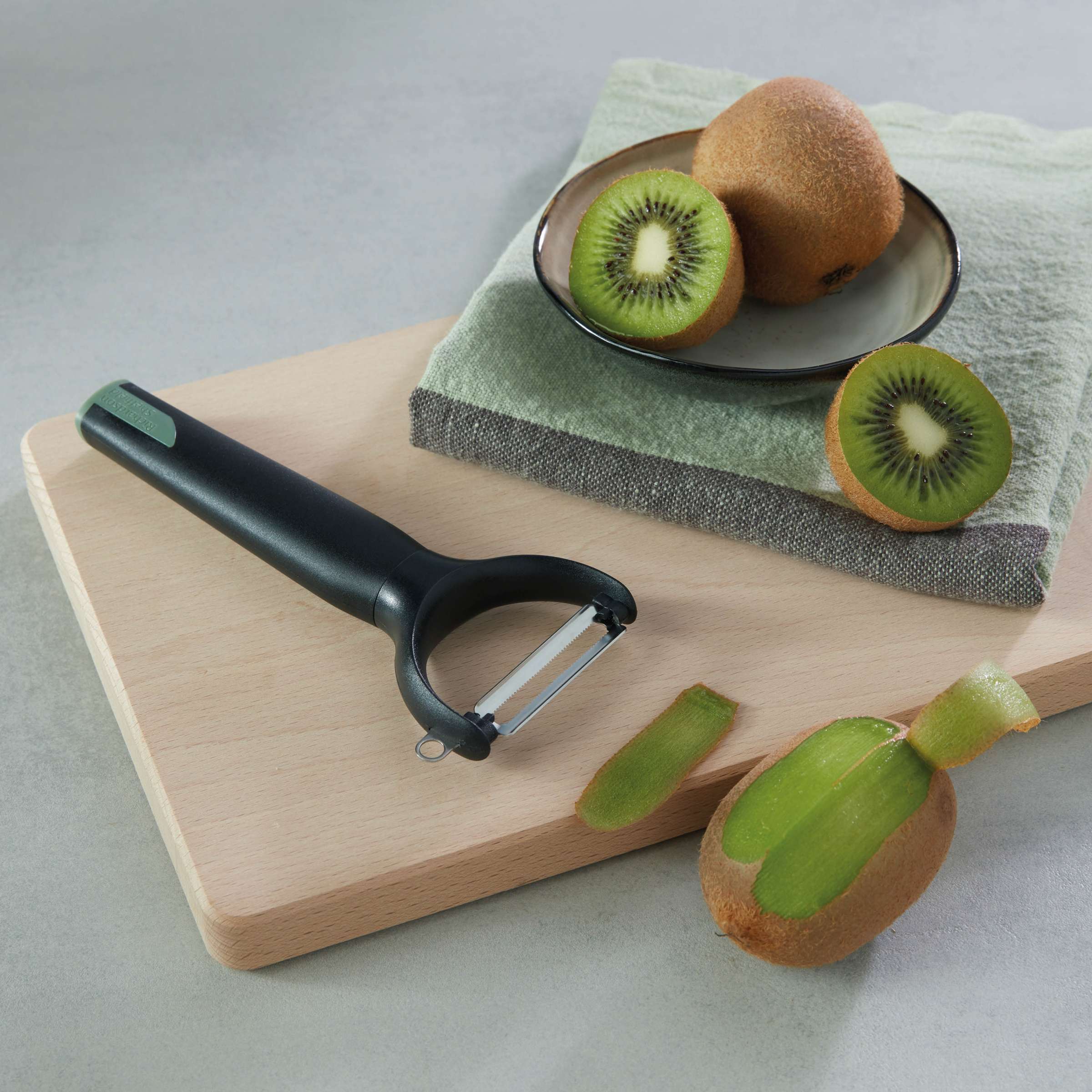 REFINEST Éplucheur Y lame dentelée