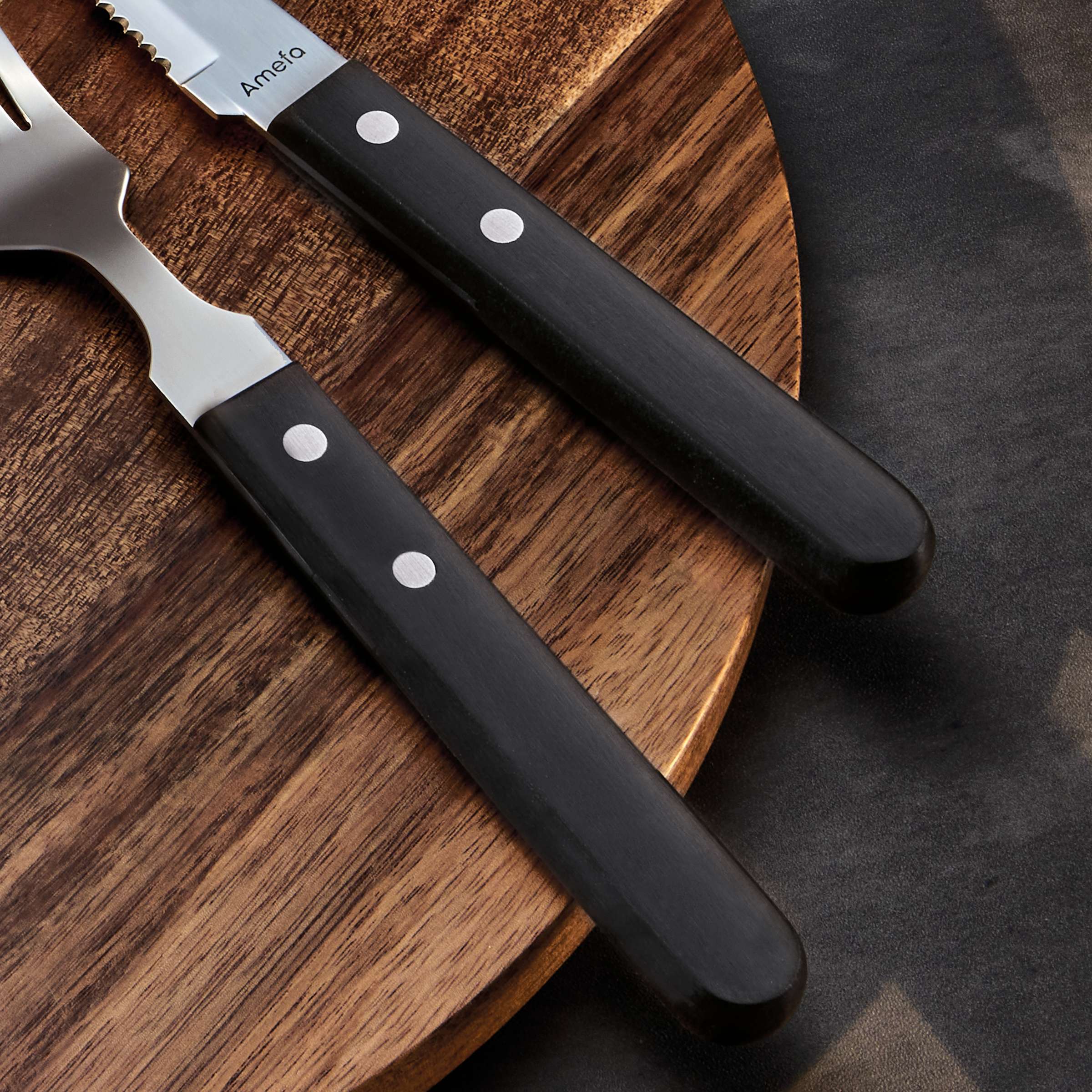 Amefa Pizza Steakgabel Set, 6-teilig, schwarze Besteckgabeln für Pizza und Steak, auf weißem Hintergrund fotografiert.