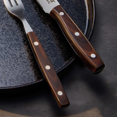 Amefa Porterhouse Steakmesser Set mit zwei Messern aus Holz, elegantes Besteck für Steak und Fleisch.