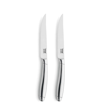Amefa PRIME RIB Steakmesser Set, 2-teilig, Edelstahl, mit scharfen Klingen und ergonomischen Griffen auf hellem Holztisch.