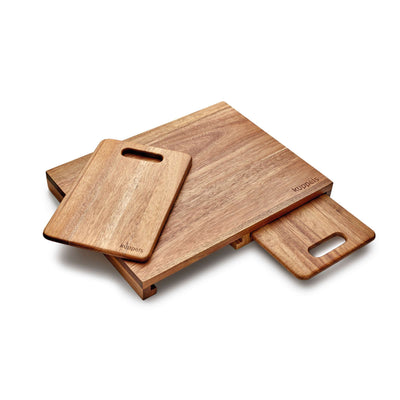 Schneidebrett von Kuppels, aus Holz gefertigt, mit glatter Oberfläche, ideal zum Schneiden und Zubereiten von Lebensmitteln.