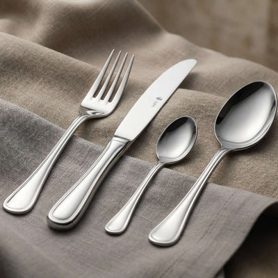 Paul Wirths Besteckset, 60-teilig, Besteck mit Messer, Gabel und Löffel aus Edelstahl, elegant auf einem gedeckten Tisch.